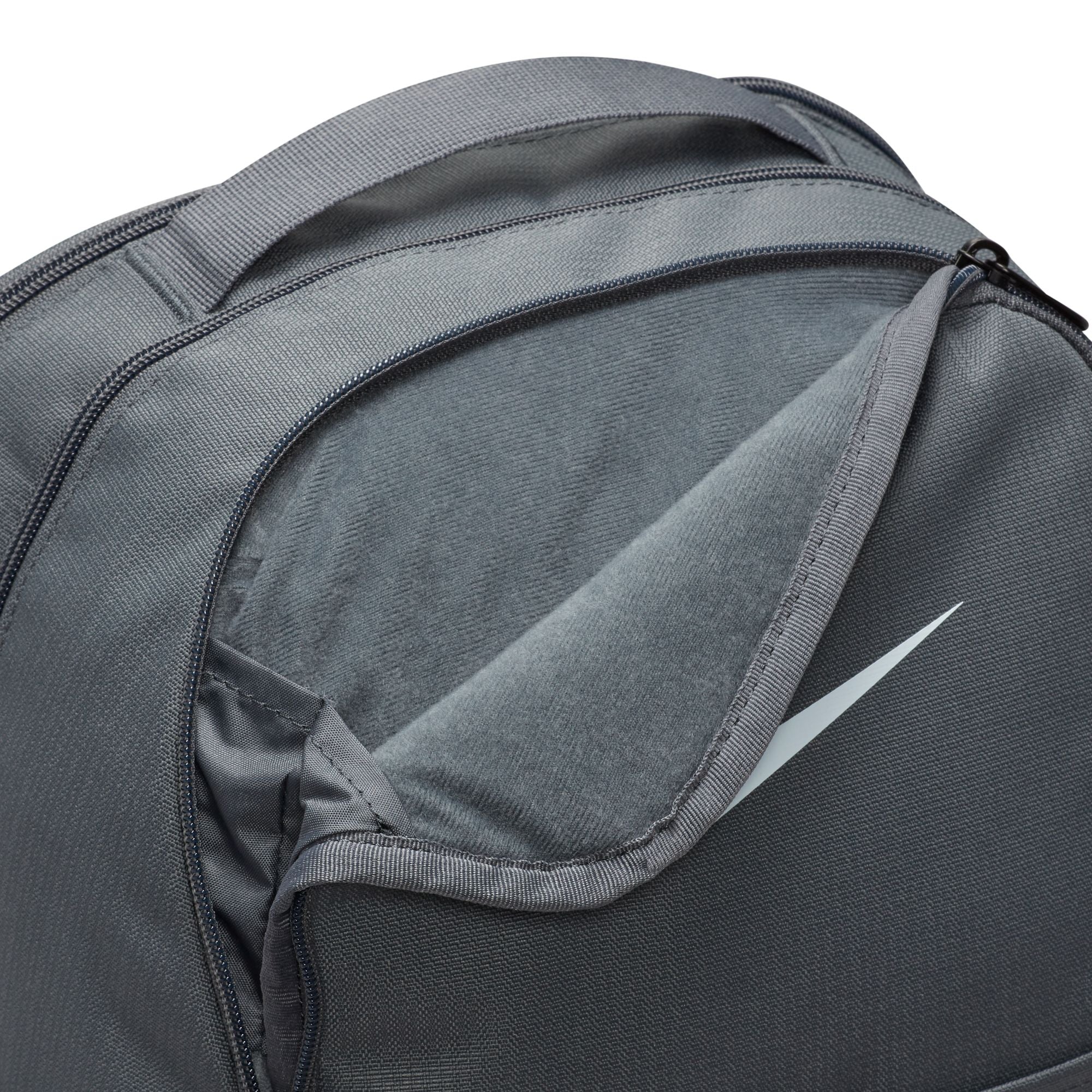 nike brasilia 7 xl backpack flint grey OSFA / / NKDH7709 The zippered main compartment is complemented by a ventilated front pocket Nike Brasilia Backpack